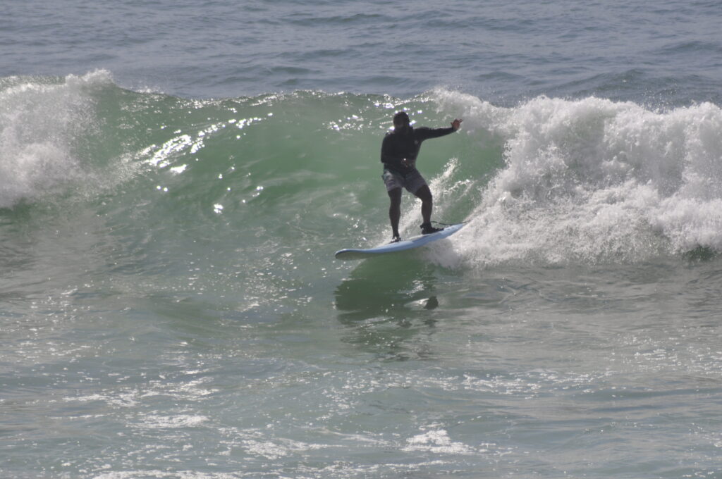 Morocco surfing lesson beginner longboard wave